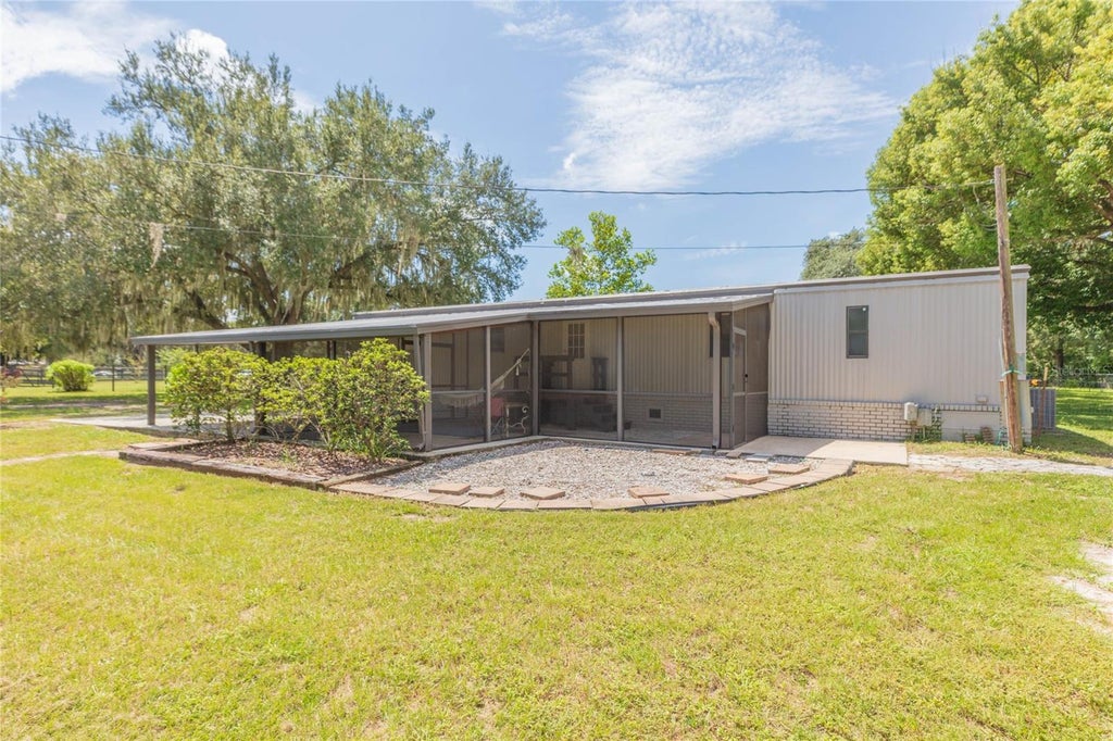 Photo of 4211 Lowell Lane, Zephyrhills, FL 33541 (MLS # TB8542806)