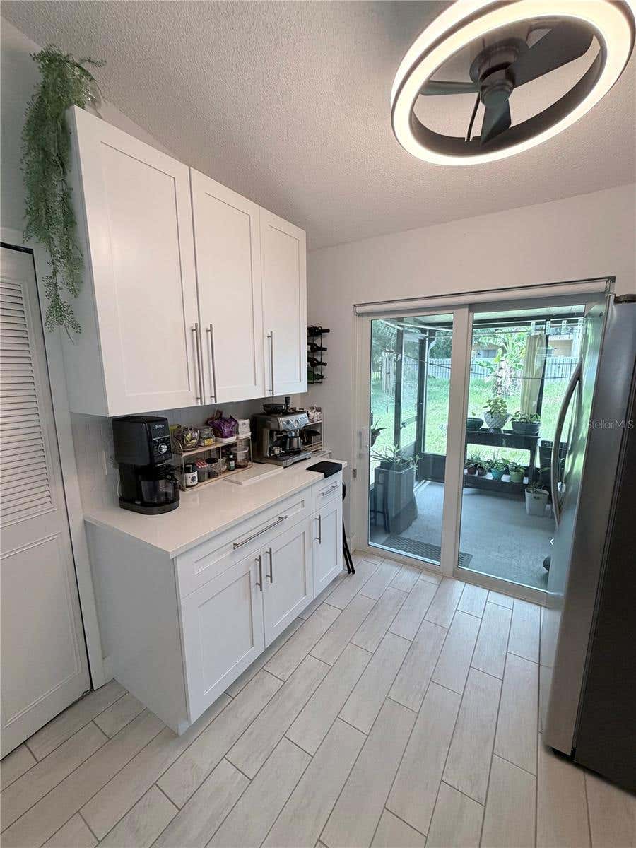 Photo of 12327 Coral Reef Drive, Orlando, FL 32826 (MLS # O6420202)