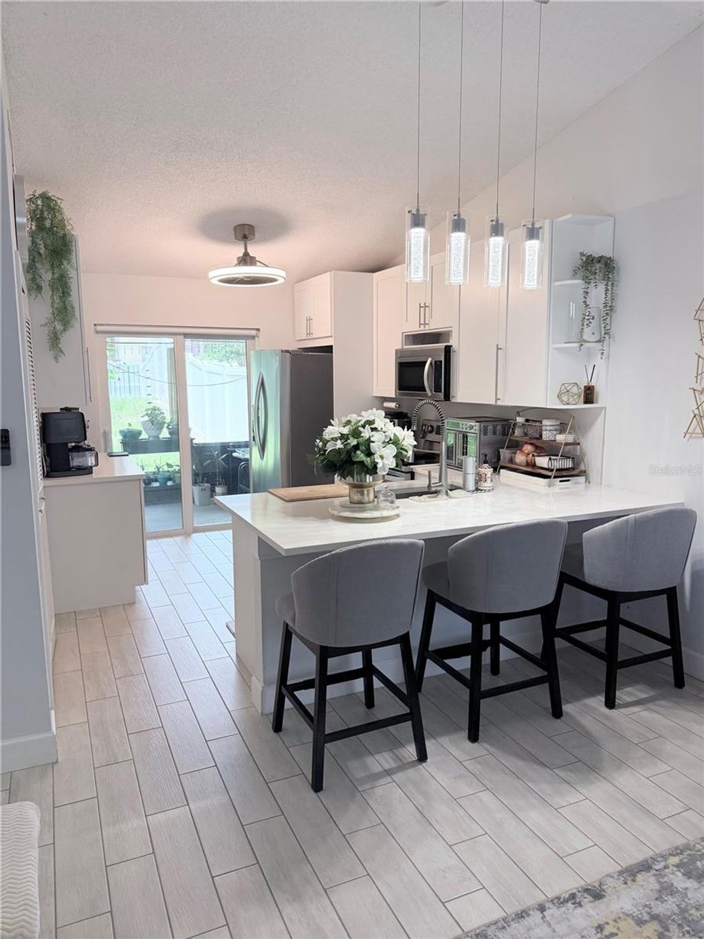 Photo of 12327 Coral Reef Drive, Orlando, FL 32826 (MLS # O6420202)
