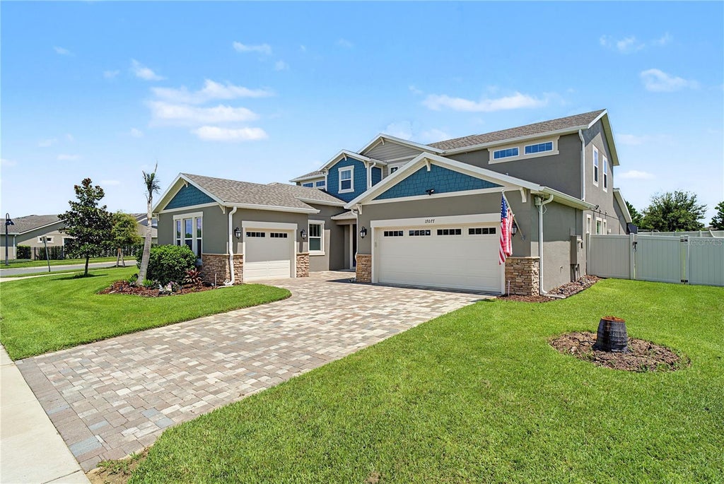 Photo of 17077 Wingspread Loop, Winter Garden, FL 34787 (MLS # O6437444)