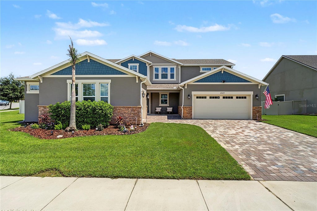 Photo of 17077 Wingspread Loop, Winter Garden, FL 34787 (MLS # O6437444)