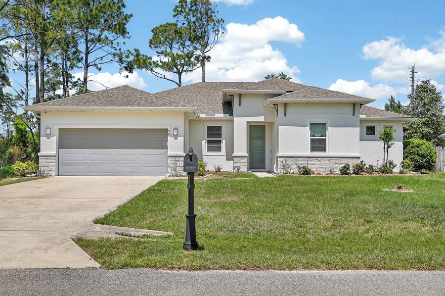 Discover modern comfort and space in this beautifully built 4-bedroom, 3-bath home crafted in 2020 by Brite Homes Builders. Offering over 2,300 square feet of living space, this residence features a desirable open-concept design with a split floor plan that provides both functionality and privacy for today’s lifestyle.
Step inside to find durable and stylish LVP flooring flowing throughout the home, complementing the bright and airy layout. The spacious kitchen opens seamlessly to the main living and dining areas, making it perfect for entertaining or everyday living. A standout feature is the private mother-in-law suite, ideal for extended family, guests, or even a home office setup.
The oversized two-car garage includes a dedicated workbench area, offering added versatility for storage, hobbies, or projects. Out back, enjoy a screened-in patio that overlooks a fully privacy-fenced yard—perfect for relaxing evenings, pets, or gatherings with family and friends.
Located in the growing community of Palm Coast, this home offers the perfect balance of peaceful living and convenience. Palm Coast is known for its beautiful parks, walking and biking trails, and easy access to the Intracoastal Waterway. Just a short drive away, you’ll find the pristine beaches along the Atlantic Ocean, as well as nearby destinations like Flagler Beach for dining, fishing, and coastal charm.
With newer construction, a flexible layout, and a prime location, this home is an excellent opportunity to enjoy all that Palm Coast has to offer while settling into a move-in-ready space designed for modern living.