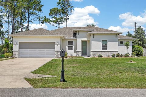 Photo of 98 Bud Hollow Drive, Palm Coast, FL 32137 (MLS # V4948294)