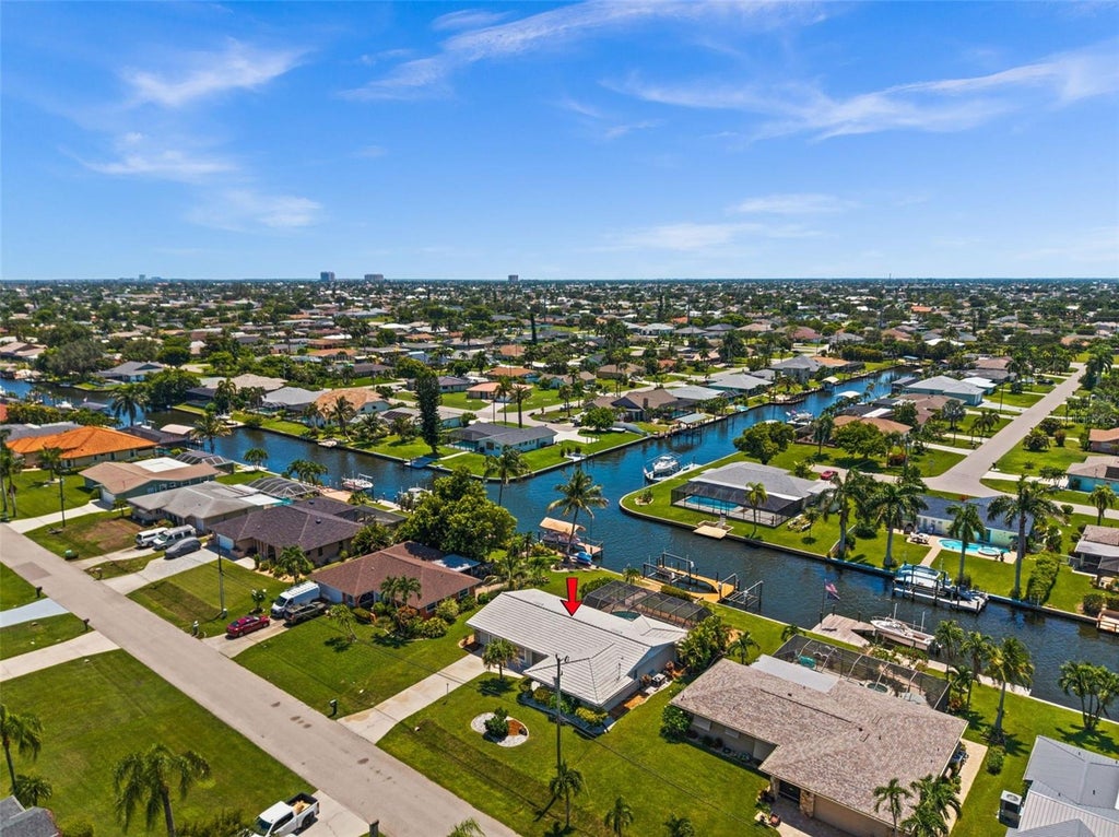 Photo of 4102 SE 1st Place, Cape Coral, FL 33904 (MLS # C7528892)