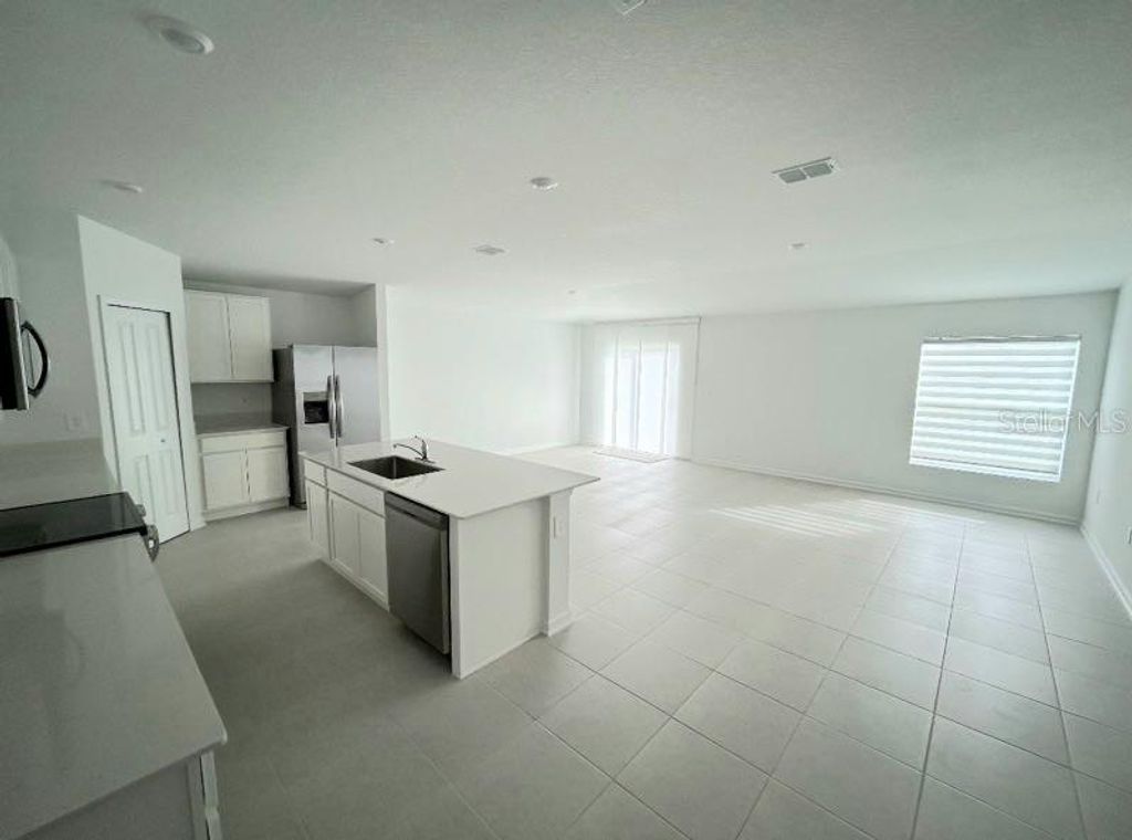 Photo of 5056 SW Barnet Dr #5056, Davenport, FL 33837 (MLS # O6369476)