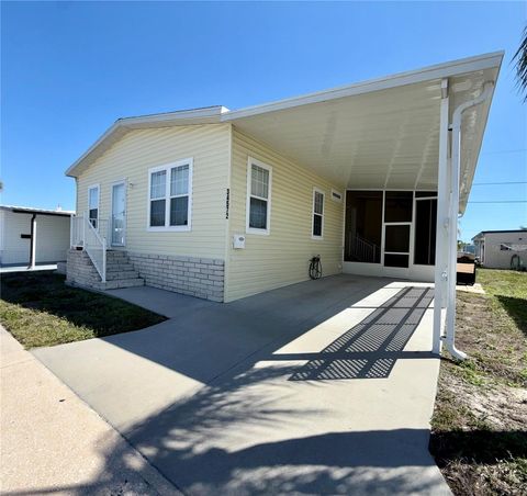 Photo of 34572 Gardenia Drive N, Pinellas Park, FL 33781 (MLS # TB8488548)