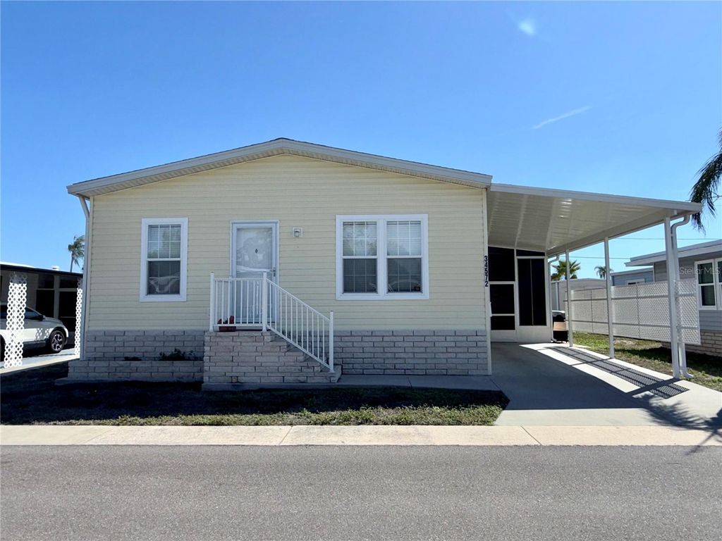 Photo of 34572 Gardenia Drive N, Pinellas Park, FL 33781 (MLS # TB8488548)