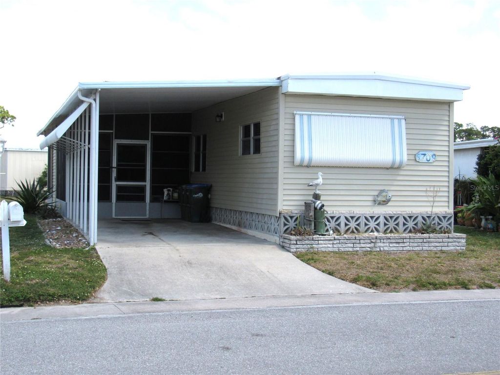 Photo of 5709 Holiday Park Boulevard, North Port, FL 34287 (MLS # C7525550)