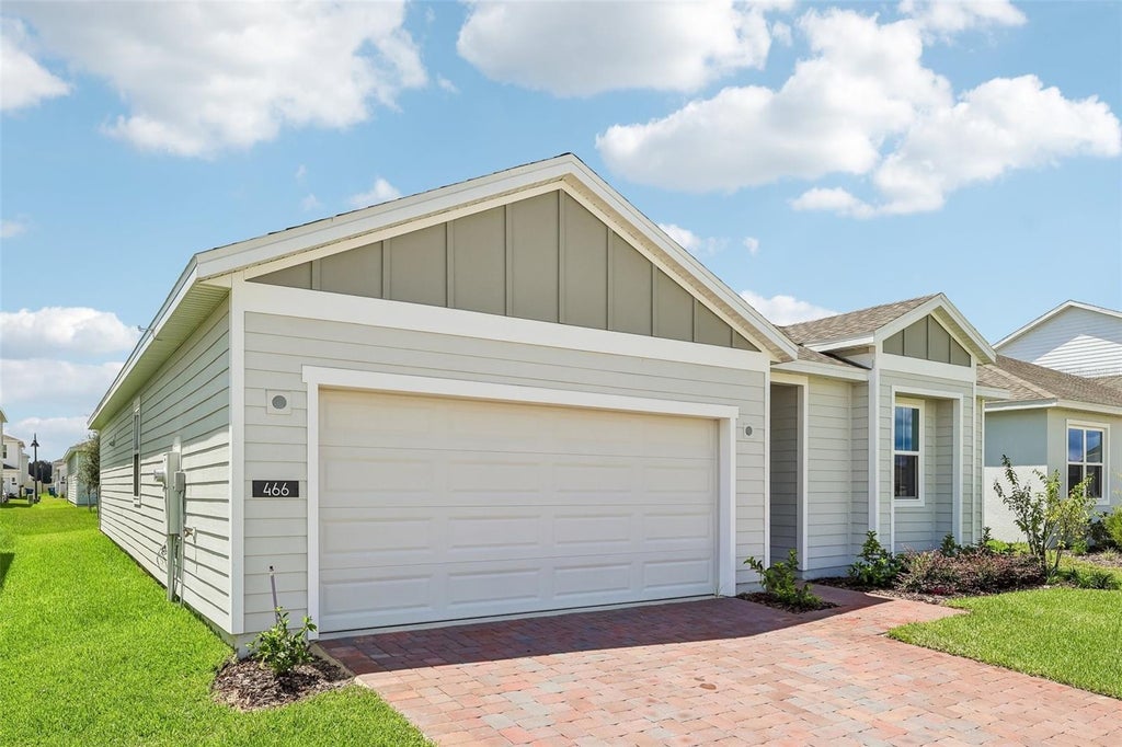 Photo of 466 Marion Loop, Haines City, FL 33844 (MLS # O6418560)
