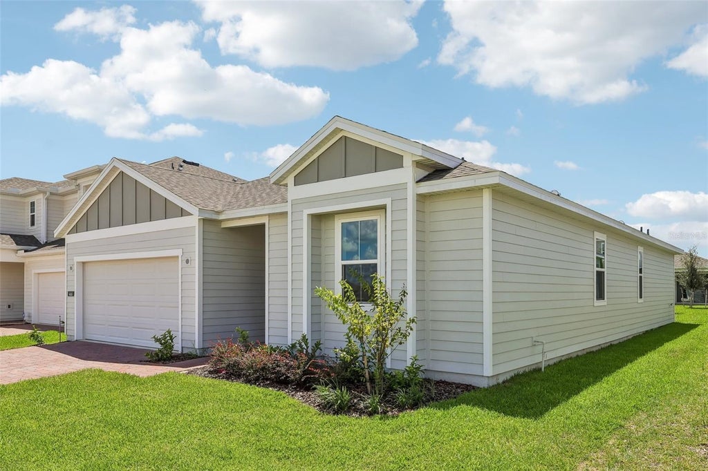 Photo of 466 Marion Loop, Haines City, FL 33844 (MLS # O6418560)