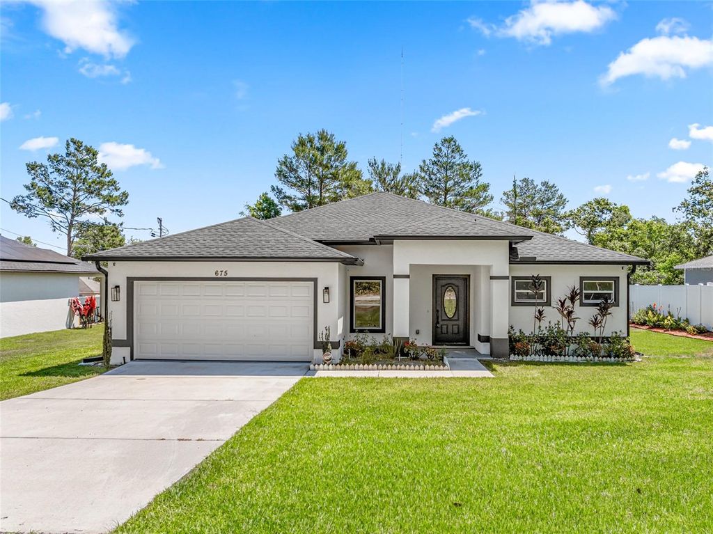 Photo of 675 S Cedar Avenue, Orange City, FL 32763 (MLS # O6367288)