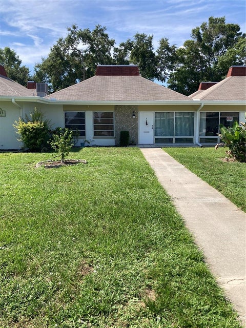 Photo of 4313 Tahitian Gardens Circle Circle #B, Holiday, FL 34691 (MLS # TB8534758)