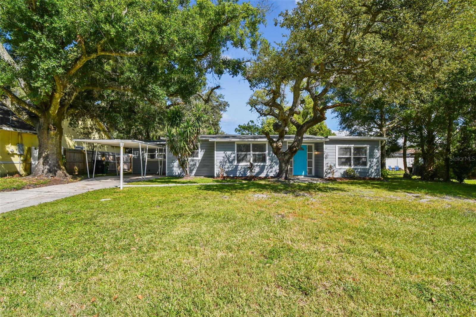 It's all about the location and the opportunity!!! This 4 Bedroom, 2 Bathroom home is tucked at the end of a quiet cul-de-sac and close to all that Tampa has to offer. The kitchen and both bathrooms have been updated, but there's room for improvements - making it an excellent choice for buyers ready to roll . The backyard is spacious and fully fenced. The true highlight is the setting, a quiet street with mature landscaping and minimal traffic with close proximity to bustling Tampa.
