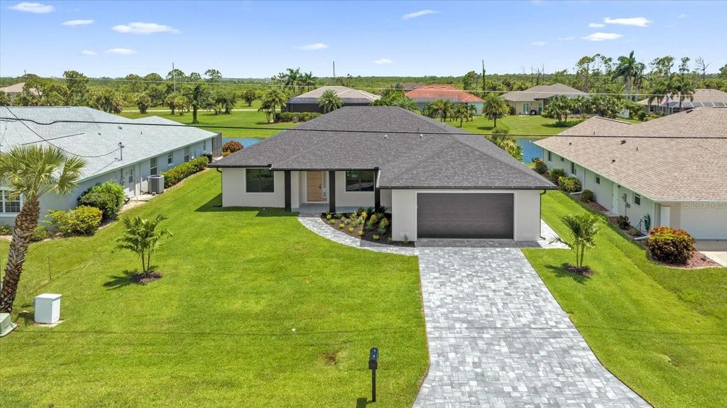 Photo of 1173 Rotonda Circle, Rotonda West, FL 33947 (MLS # TB8411533)