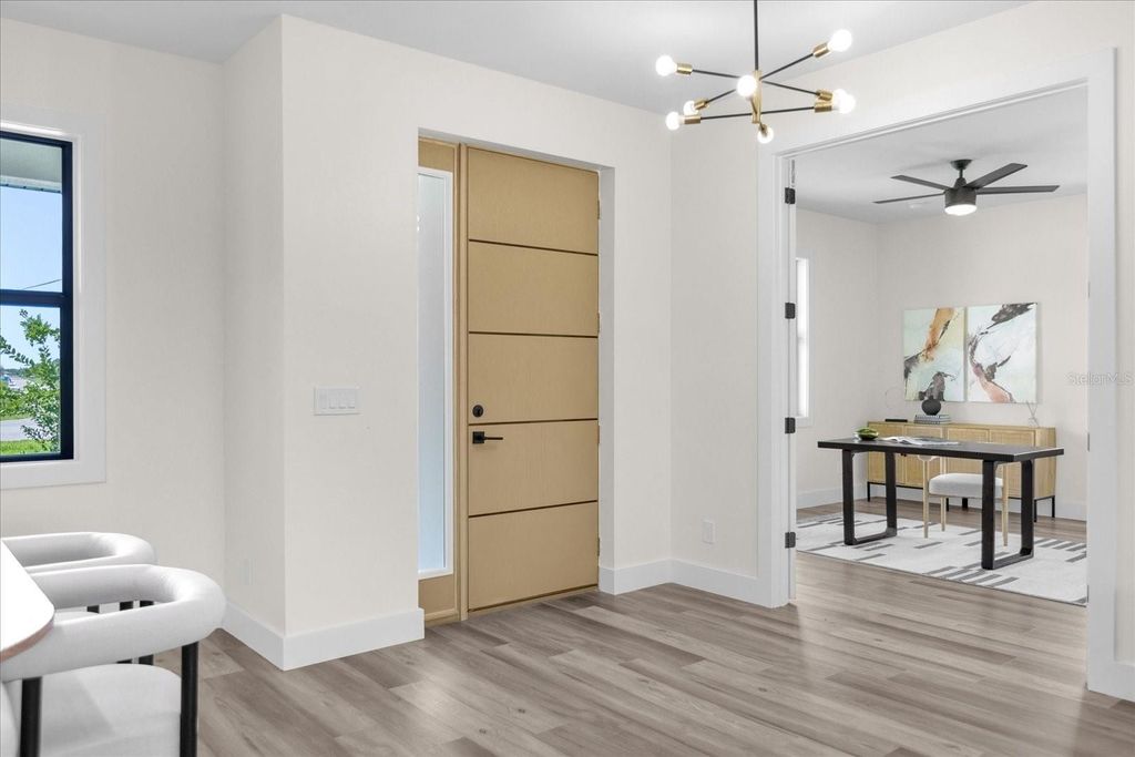 Photo of 1173 Rotonda Circle, Rotonda West, FL 33947 (MLS # TB8411533)