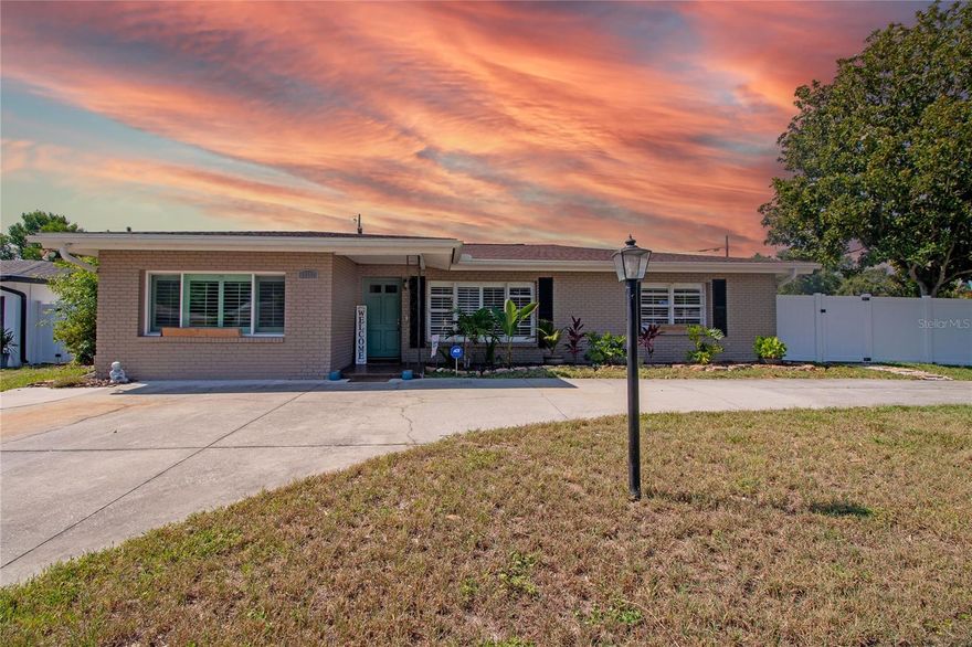 Your second chance at a dream home has arrived—serendipity strikes as this stunning property is back on the market due to buyers financing falling through. Act fast, the SELLER IS MOTIVATED and ready to make your home-owning dreams come true!

Welcome to this sprawling sanctuary featuring 3 generously large bedrooms with plantation shutters and built in closets, 2 spa-like bathrooms, plus a versatile Office/Den—all sitting on an expansive corner lot. Need parking? The CIRCULAR DRIVEWAY + extra long double wide drive way can host your cars, boats, and weekend toys with room to spare. 

Step inside to find a meticulously updated and lovingly maintained space. The open-concept floor plan flows like a gentle breeze, adorned with stylish ceramic wood-grain flooring—yep, that means zero carpet to worry about!

At the heart of the home, the chef’s kitchen beckons with ample cabinetry and pantry space. And trust us, the dining room isn’t just for dining—it’s a hub that connects seamlessly with the kitchen, living room, and family room.

Bathing in natural light, this residence features elegant Plantation Shutters throughout and a family room that’s the epitome of cozy, complete with a fireplace. Elegant French doors invite you out to your own tropical paradise. 

The covered patio is a slice of heaven for al fresco dining, entertaining, or simply lounging. As for the backyard, it's your own private resort featuring a sparkling in-ground pool with a brand-new filtration system, framed by a newly constructed barn-style storage shed and enclosed by a fresh vinyl fence.

Prime Location Alert! A stone's throw from sandy beaches, bustling Downtown, and a smorgasbord of dining and shopping options. Commuting? Tampa International Airport is easily accessible, and so are key amenities like Bay Pines VA. 

Recent upgrades include a 2018 roof, 5-ton A/C unit from 2019, a 2022 rainwater irrigation system (hello, eco-friendly!), and refreshingly updated main bathroom and office. 

Don't let this dream slip through your fingers again—make it yours today!

 Home has already passed inspection and passed appraisal.