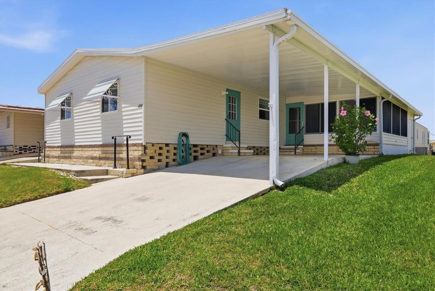 Welcome to Tidevue Estates, a land-owned active 55+ community offering comfort, style, and flexibility. This well-maintained home features dual driveways—one with a charming open front porch perfect for creating your outdoor living space, and the other with a covered carport. Step inside to an open and inviting living room complete with built-in bookshelves, and electric fireplace. The home features vaulted ceilings, laminate flooring, drywall throughout, and 2-inch blinds. A dedicated inside laundry room with ample storage plus office space and room to do crafts. The thoughtfully designed split-bedroom floor plan provides privacy. The updated second bathroom showcases a ceramic tile walk-in shower and granite countertops. The spacious primary bedroom includes a ceiling fan, walk-in closet, and an updated en-suite bathroom featuring a granite vanity and a walk-in rain shower. Enjoy year-round relaxation in the 21x14 Florida room with recessed lighting on dimmers, carpet, and acrylic windows—ideal for entertaining or unwinding. Additional features include a 10x10 storage shed with workbench and workshop space, plus a membrane roof just 3 years old with a transferable warranty. Low HOA of only $600 annually. Pets are not permitted. Plenty of activities to keep you busy in this community. Updated fitness center. Meet friends and make new ones for a game of indoor pickleball, bocce ball, or shuffleboard. Join the Golf League. Take a bike or golf cart ride to Veterans Park to watch the wildlife and enjoy the sunset. Ellenton Premium Outlet Mall, restaurants, and medical facilities are just minutes away. Easy access to I-75 to explore Sarasota. Not to mention a short drive to our beautiful Gulf Beaches. Don’t miss this opportunity—move in and start enjoying the Florida lifestyle today!Seller will consider owner financing, making this a fantastic opportunity to own your piece of paradise in Tidevue Estates!