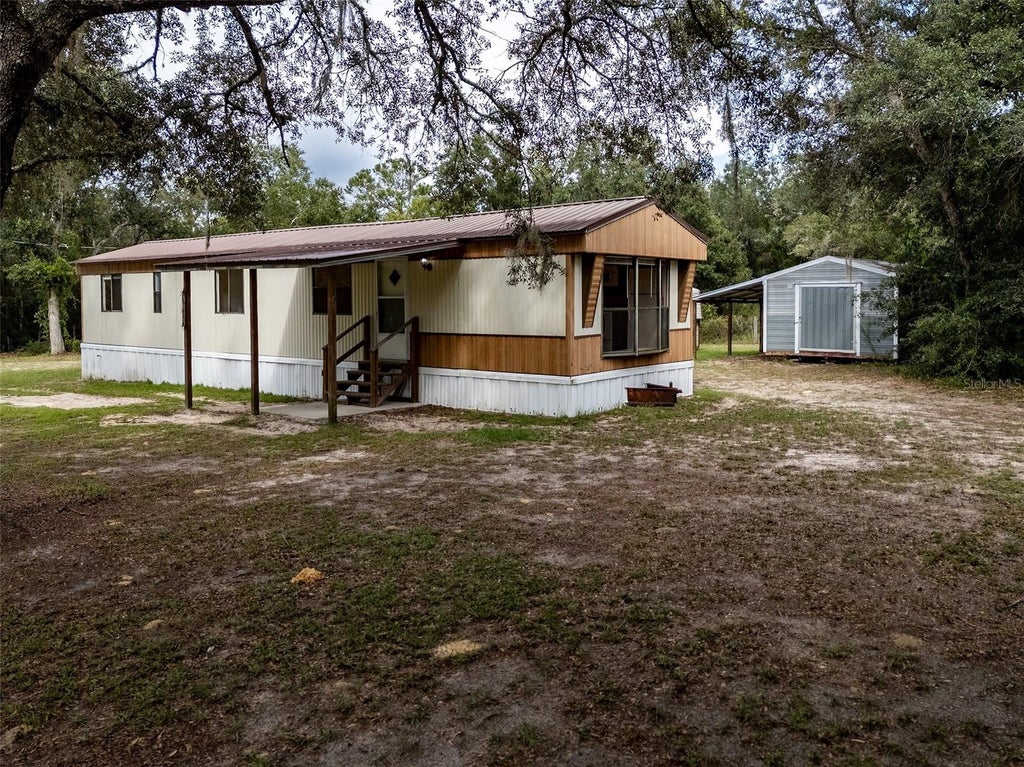 Photo of 5865 NE 137th Terrace, Williston, FL 32696 (MLS # OM732434)