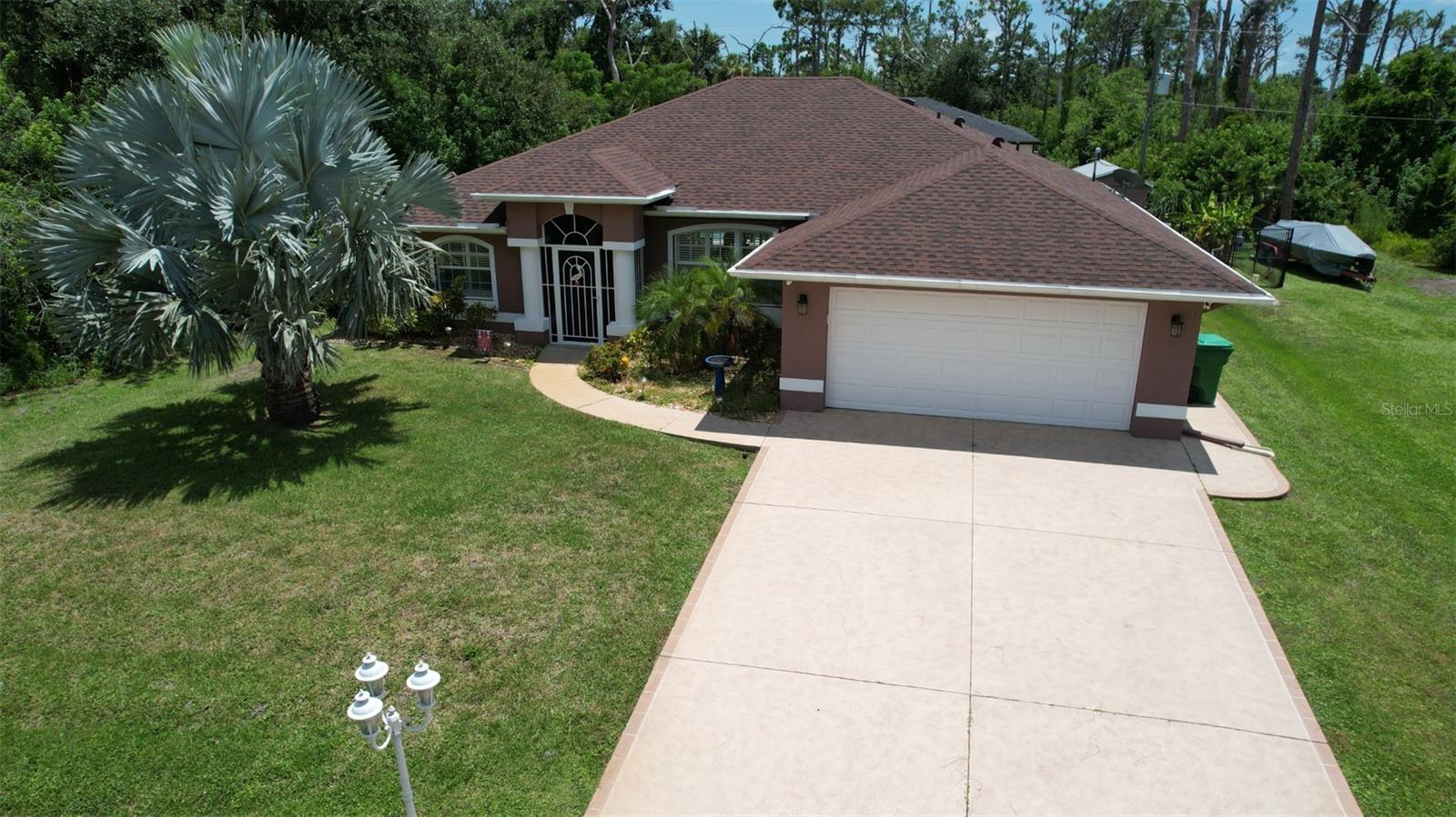 DOG FRIENDLY FULLY FURNISHED POOL HOME WITH A SOUTHERN EXPOSURE FOR ALL DAY SUN ACROSS THE POOL - THIS HOME IS KEPT VERY CLEAN AND WITH THE EXCEPTION OF A DOG ACCESS DOORS TO THE OUTSIDE YOU WOULD NEVER KNOW THE OWNER HAS 2 DOGS OF THEIR OWN - LOCATED IN BEAUTIFUL ENGLEWOOD FLORIDA THE HOME FEATURES A SPLIT FLOOR PLAN WITH GUEST BEDROOMS TO ONE SIDE AND THE MASTER SUITE TO THE OTHER ----- NEW 82" WALL MOUNTED TV WITH RECLINING LEATHER SEATING - DINING ROOM SEATING FOR 6 --- COVERED LANAI WITH SEATING AND BARBEQUE GAS GRILL NEXT TO A HEATED IN GROUND SWIMMING POOL. THE BACK YARD IS COMPLETELY FENCED IN WITH PRIVACY SCREENING AND WOODED LOTS ON BOTH SIDES FOR MAXIMUM PRIVACY ---- HOME FEATURE AN R/O DISPENSER AT THE SINK ---- WHOLE HOME, EASY TO USE, ONE BUTTON ARM AND DISARM SECURITY SYSTEM FOR PEACE OF MIND AT NIGHT ----- SLEEP NUMBER ADJUSTABLE BED IN MASTER BEDROOM AND ONE PARKING SPACE IN THE GARAGE NEXT TO THE OWNERS CAR. THE MONTHLY RATE INCLUDES TAXES WITH ALLOWANCES FOR WATER AND ELECTRIC. SHOPPING - BEACHES - GOLF COURSES - BOATING - RESTAURANTS AND MORE ALL SHORT DRIVES FROM THIS LOCATION MAKING THIS ONE OF ENGLEWOODS MORE DESIREABLE AREAS TO STAY.