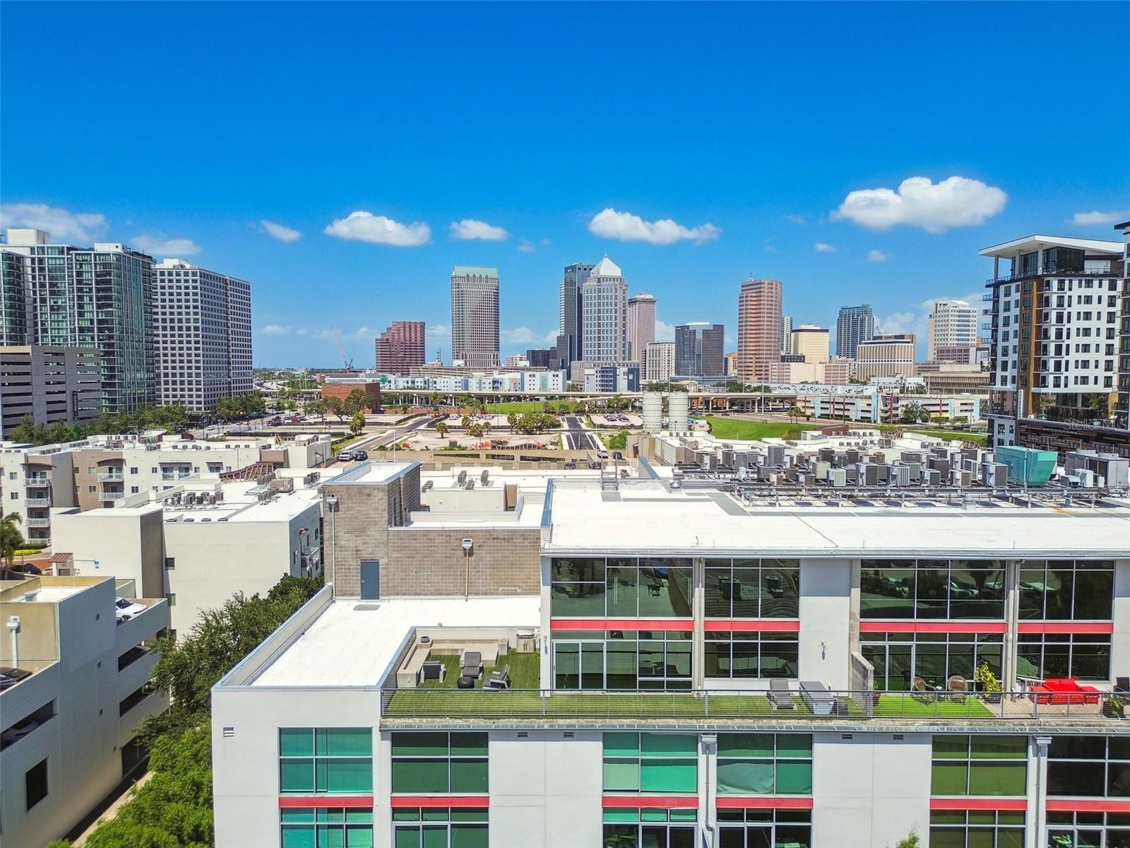 Feast your eyes on this 1 of 1 Luxury Corner Penthouse Unit in Victory Lofts located in the Downtown Tampa Neighborhood of Neighborhoods! The Channel District. This Penthouse offers ultimate privacy, fixtures, finishes and design elements that will gain your appreciation through each and every avenue. Two story corner unit with a breathtaking amount of windows and 22 ft tall ceilings overlooking the Port Of Tampa Cruise terminals and Sparkman Wharf. Fully Furnished with Restoration Hardware furniture, outfitted with Lutron Automatic smart shades, Sonos Speaker system throughout and personal cold plunge on your enormous oversized, fully turfed corner balcony ( over 900 sqft! ). This unit includes 2 assigned parking spaces ( as well as 2 street parking permits), just steps from the elevator which lead you directly to your front door, giving this unit even more of a private feel. Wake up in your primary bedroom every morning to the sunrise as your bedroom shades rise with the incredible view of Cruise Ships right in your backyard.
Walk, Scooter, E-Bike, Dash, Uber, or ride the trolley to all of the surrounding businesses and attractions. Some of the more popular options include Publix, Greenwise Publix, Duckweed Grocery, Crunch Gym, Gold's Gym, Starbucks, Gingerbeard Coffee, Victory Coffee, Riverwalk, Water Street, Sparkman Wharf, Edition Hotel and Amalie Arena.
This renovated condominium is a testament to luxurious living, offering an exquisite blend of comfort, style, and modern convenience. Come, experience this phenomenal property for yourself. Your new lifestyle awaits.