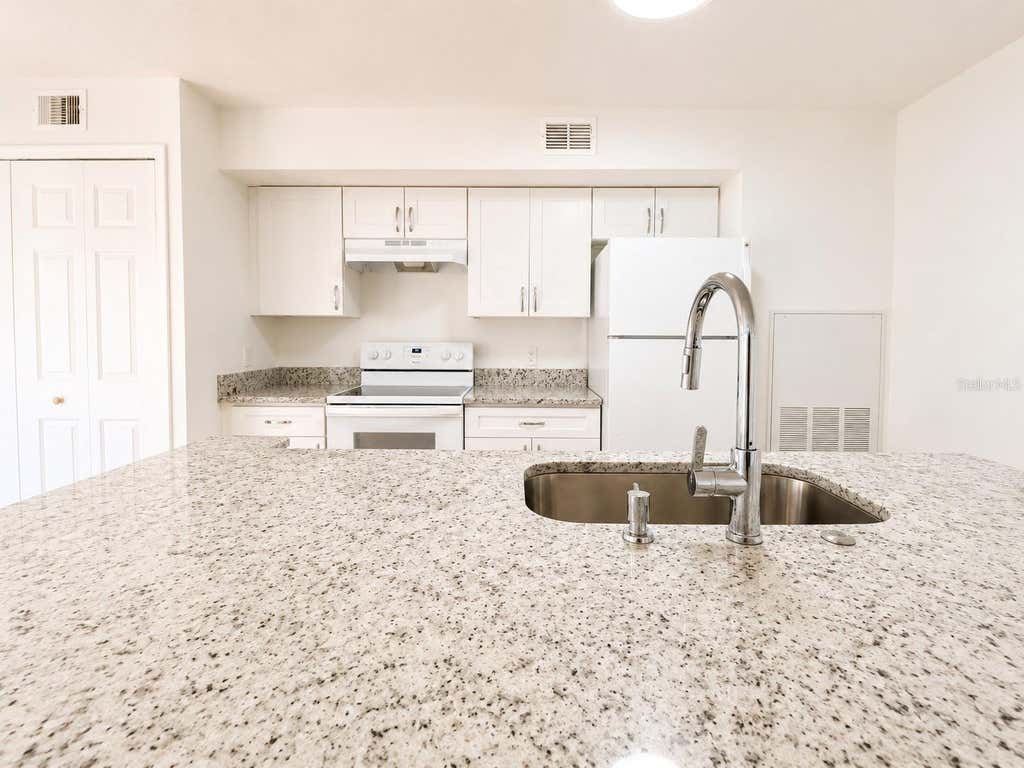 Photo of 4702 Sutton Terrace #108, Orlando, FL 32811 (MLS # O6426100)