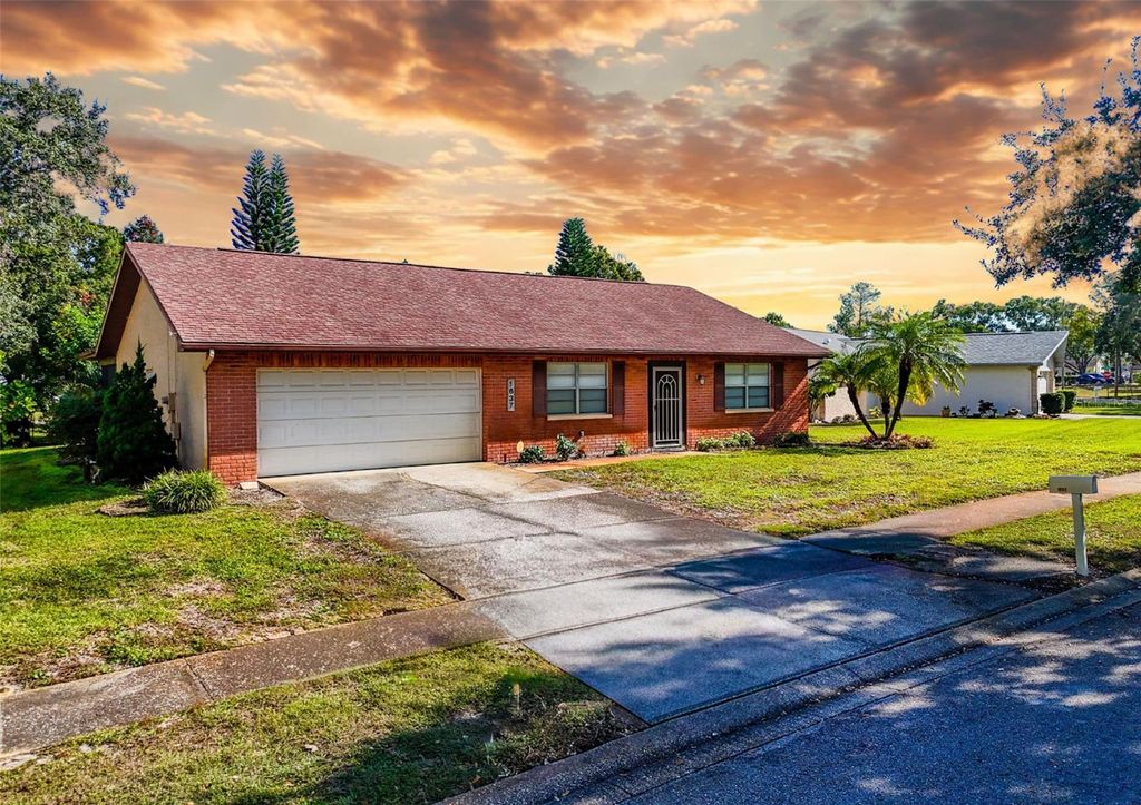 Photo of 1637 Caledonia Drive, Palm Harbor, FL 34684 (MLS # TB8452231)