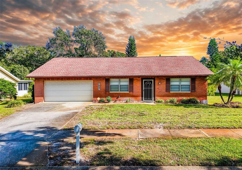 Photo of 1637 Caledonia Drive, Palm Harbor, FL 34684 (MLS # TB8452231)