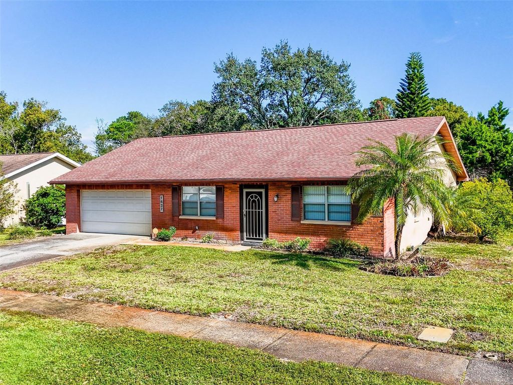 Photo of 1637 Caledonia Drive, Palm Harbor, FL 34684 (MLS # TB8452231)