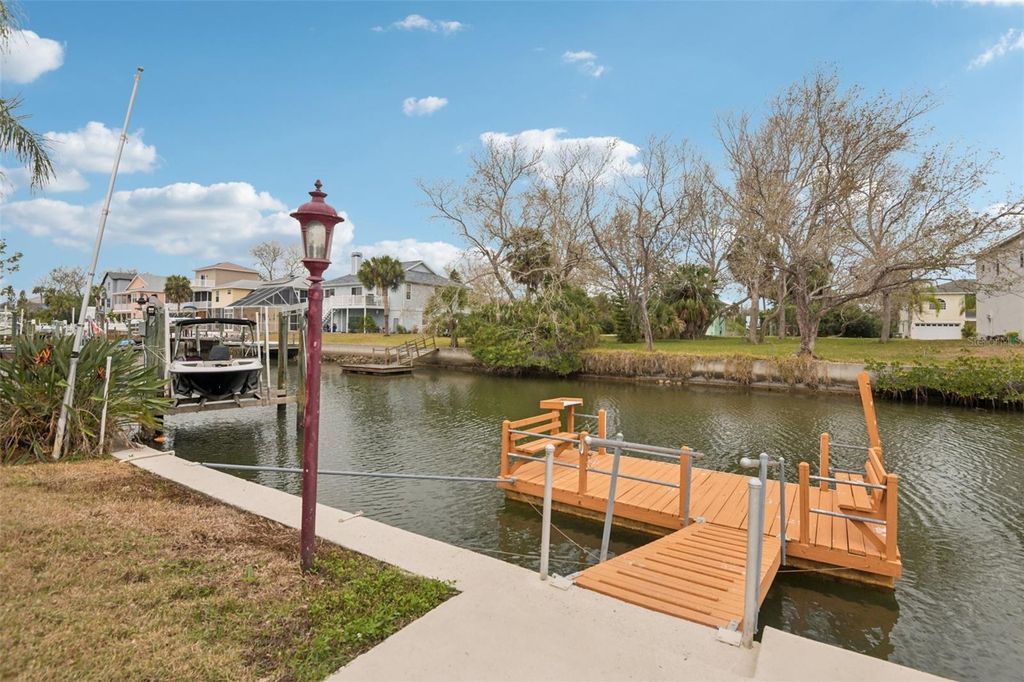 Photo of 7619 Hatteras Drive, Hudson, FL 34667 (MLS # TB8468309)