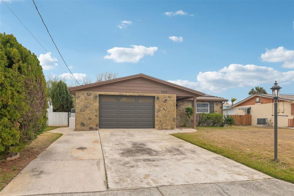 Photo of 7619 Hatteras Drive, Hudson, FL 34667 (MLS # TB8468309)