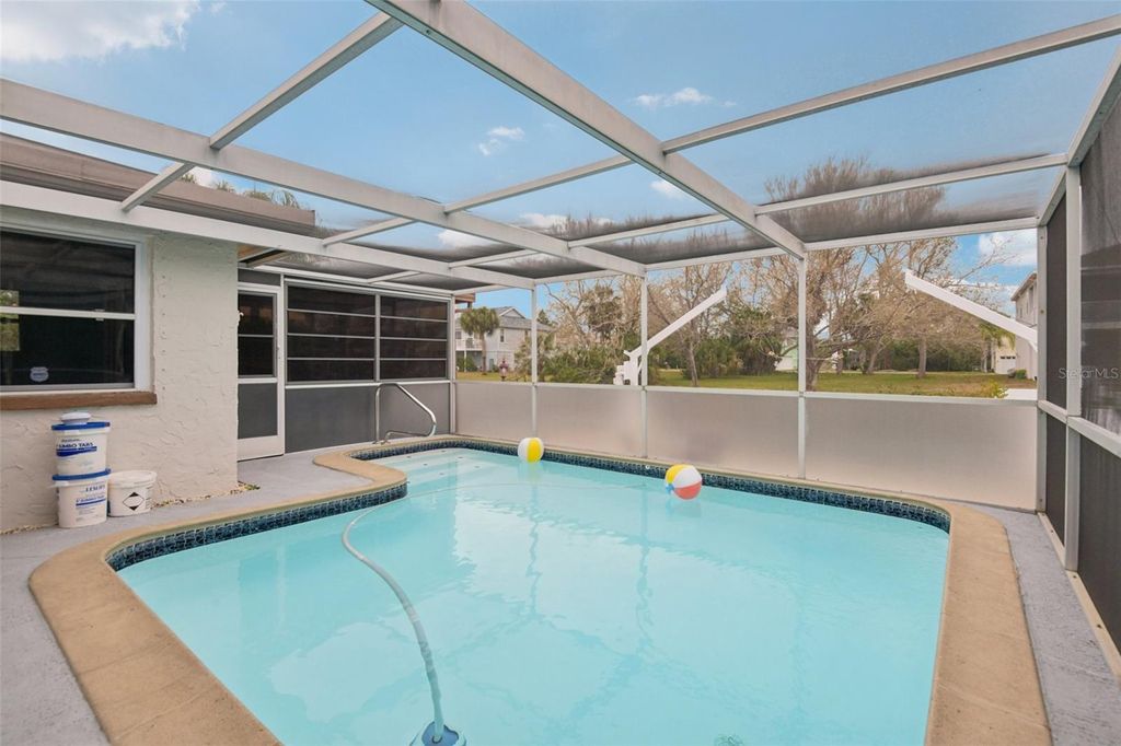 Photo of 7619 Hatteras Drive, Hudson, FL 34667 (MLS # TB8468309)