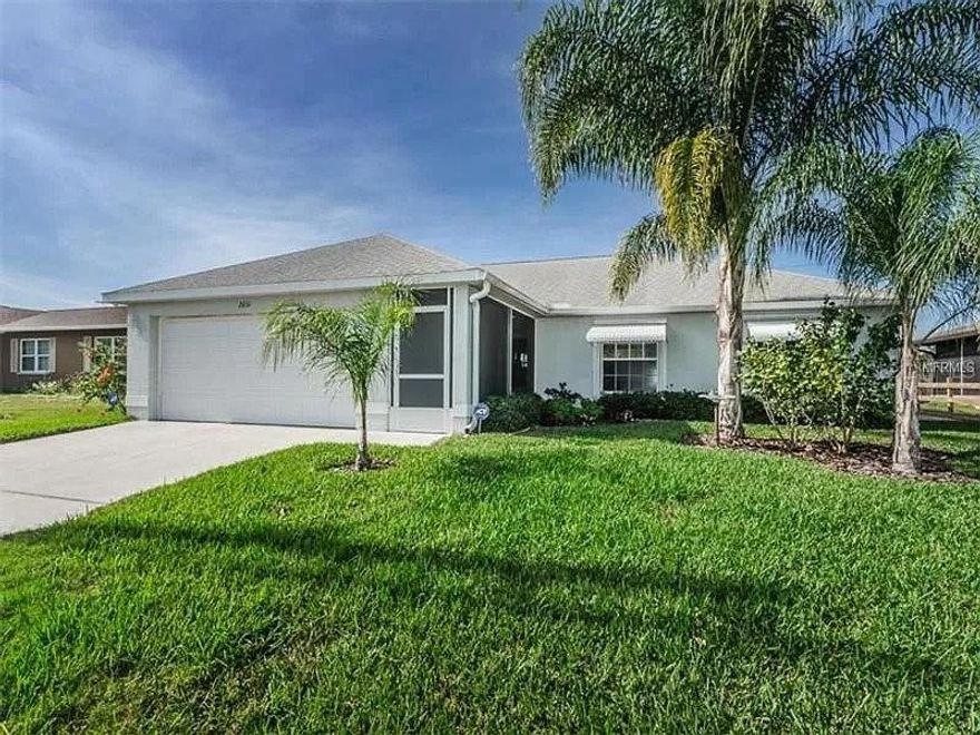 WOW! Water front property with HUGE CUSTOM deck built along the water and PRIVATE boat dock/pier. Walk through the front door and see the open floor plan lit by natural light shimmering over the waterway.This immaculate home features 3 bedrooms, 2 bathrooms, and a 2-car garage, with plenty of space for a large family. The highlight of this property is the private boat dock/pier located just out back with a custom deck the full width of the home with a ramp leading to the dock. spend your evenings kayaking or fishing while enjoying the serene canal views.   Also fully enclosed patio full width of the home.  Truly spectacular backyard. Loaded with fruit trees ranging from figs, olives, papayas and more. Newer roof, air conditioner and water heater. Come and pull the trigger on this 3 beds 2 bath home on a SUPER QUIET street. You will find nothing like this WATERFRONT PROPERTY.