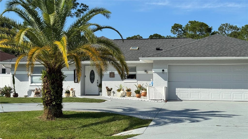 Photo of 8 Whippoorwill Drive, Palm Coast, FL 32164 (MLS # FC321845)