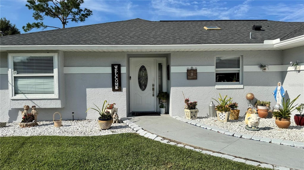 Photo of 8 Whippoorwill Drive, Palm Coast, FL 32164 (MLS # FC321845)