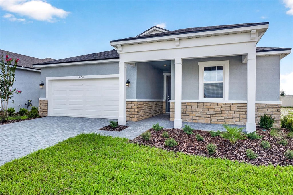 Photo of 34754 Flower Patch Drive, Dade City, FL 33525 (MLS # TB8499746)