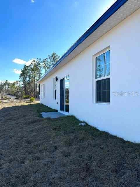 Photo of 13141 SW 83rd Terrace Road, Dunnellon, FL 34432 (MLS # O6434172)