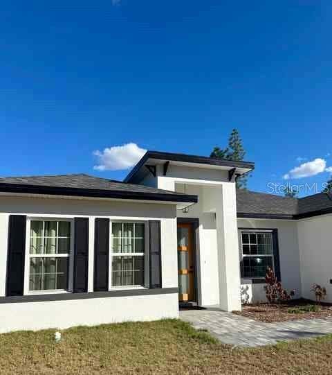 Photo of 13141 SW 83rd Terrace Road, Dunnellon, FL 34432 (MLS # O6434172)