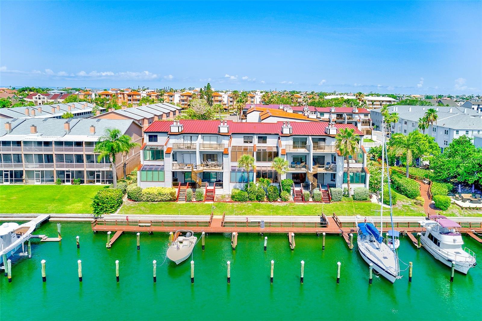 Welcome to this beautiful 2-bedroom, 2-bathroom first-floor waterfront condo in the peaceful and private community of Ciega Verde. Enjoy serene views of the intracoastal waterway right from your covered back patio—with a convenient back-patio stairwell for easy access to the grounds and docks—where you can unwind amid lush landscaping and relaxing breezes. Inside, the freshly painted interior showcases a kitchen that’s a true centerpiece, featuring rich wood shaker cabinets, granite countertops, a center island, decorative open shelving, stainless steel appliances, and tile flooring throughout. Expansive windows flood the space with natural light, especially in the dining area which overlooks the tranquil canal.
The spacious primary suite offers dual closets and a luxurious ensuite bathroom complete with a modern barn door, double vanity, and floor-to-ceiling tiled standing shower. The secondary bedroom is generous in size, with garden views and abundant natural light. An updated guest bathroom in the hallway features a quartz countertop vanity, updated tub/shower combo and fixtures, pebble flooring, and a lighted mirror.
The open-concept living area connects seamlessly to the kitchen and includes a wood-burning fireplace and large sliding glass doors leading to the covered patio. The patio itself boasts beautiful art deco flooring, a bar area, kitchen pass-through, a new ceiling fan, and convenient storage—perfect for entertaining or relaxing outdoors.
Practical upgrades abound: a new roof (2025), new AC (2025), and a dedicated inside utility closet with a full-size washer and dryer make living and maintenance a breeze. Enjoy the convenience of an assigned covered parking space just steps from your front door, along with an additional open parking space and guest parking for visitors.
This condo experienced no flooding during last year’s hurricanes; although on the first floor, the residence is set on raised construction that helps keep the living space above potential water intrusion. Association fees include: water, sewer, trash collection, pool maintenance, pest control, exterior maintenance, insurance incl. flood, and grounds care.
Ciega Verde is an intimate, laid-back community with just 32 units—offering privacy and a true sense of retreat. Community amenities include a pool, walking paths, waterfront seating, and fishing. Just minutes away is one of the world’s most unique nature preserves, a cluster of "Keys" reminiscent of the Florida Keys, offering endless opportunities to explore. Enjoy quick and easy access to the Gulf of Mexico by boat (slips are available to rent) and be just a 10-minute drive from downtown St. Petersburg, renowned restaurants, and the world-famous beaches of St. Pete Beach and Pass-a-Grille. Everyone who stays here falls in love—come see why.
