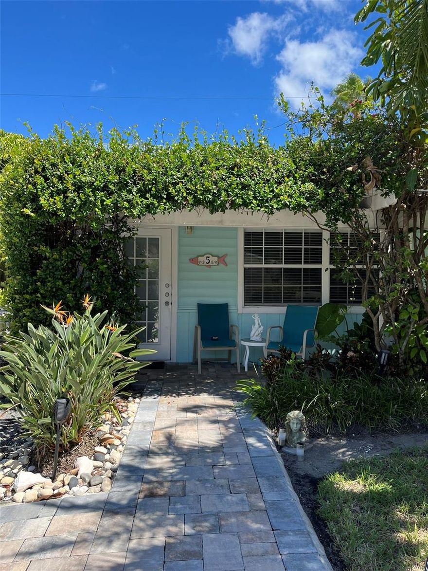 Welcome home to this beautiful island getaway.  This spacious unit offers the perfect opportunity for use as a personal vacation getaway or a high-demand short- or long-term rental. Currently in "white box" condition, it's a blank canvas ready for your custom design and finishing touches — bring your vision to life!  The spacious bedroom accommodates a king-sized bed and features a walk-in closet, catering to guest comfort and long-stay convenience.

Note: Several photos are from prior to Hurricane Helene (September 2024). 

The Tradewinds Resort is located just feet away from the beach and visitors have access to the beach at the Tortuga Inn.  This community features a community pool along the bay and a community fishing dock.  Laundry facilities are located in the main office directly across the street from the unit.  The community also has on-site management making operation of short-term rentals very simple.