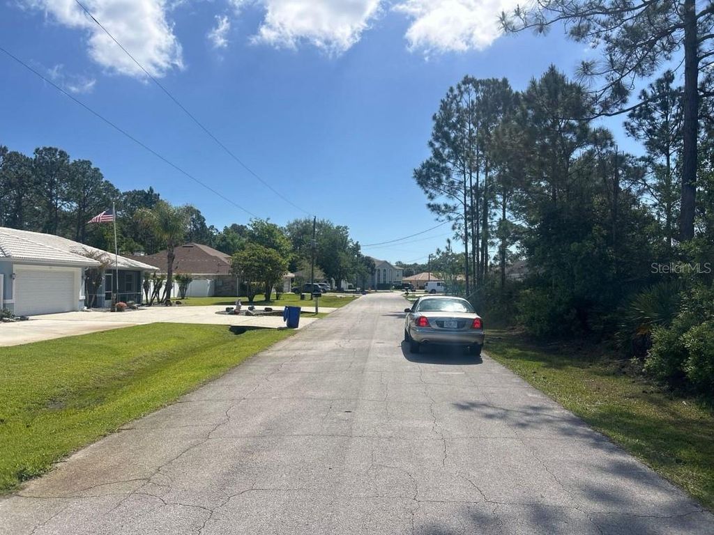 Photo of 93 Prince Eric Lane, Palm Coast, FL 32164 (MLS # A4690480)