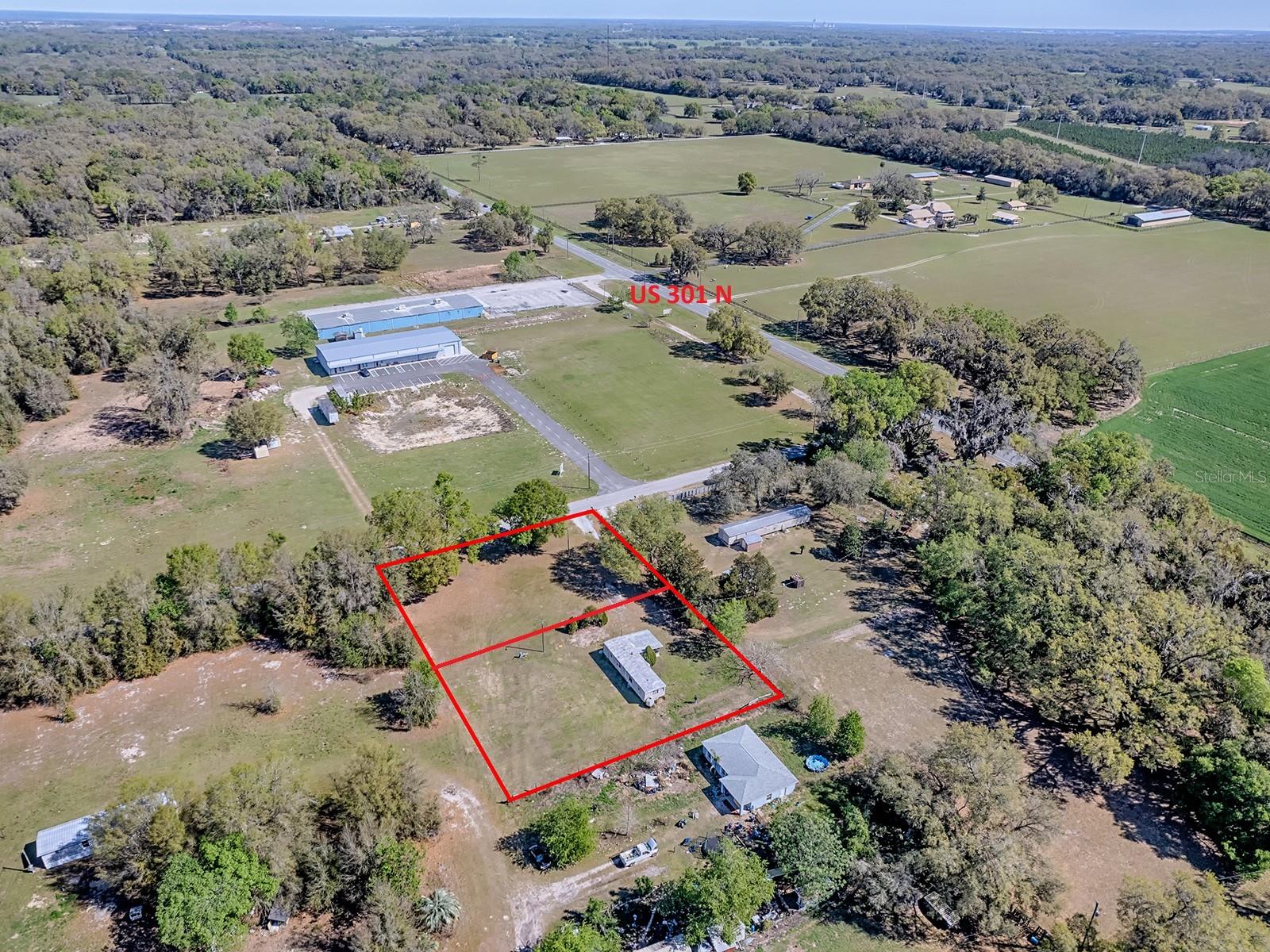 This 2-bedroom, 1-bathroom single wide mobile home on just under an acre in Bushnell, FL. The mobile home has already undergone some renovations, presenting a unique opportunity for you to step in and add finishing touches that truly make it your own. This is an ideal canvas for those who delight in personalizing their living spaces. Outside, the property features ample outdoor space, perfect for gardening, entertaining, or just enjoying Florida's beautiful weather. Whether you're hosting summer barbecues, starting a vegetable garden, or just lounging in the sunshine, this yard has the potential to become your private oasis. The property is currently separated into 2 parcels but don’t worry, the seller will combine to 1 at closing if the buyer would like or keep them separate and annex into the City of Bushnell. Don't miss your chance to own this property in Bushnell. Schedule your viewing today and start envisioning the possibilities!