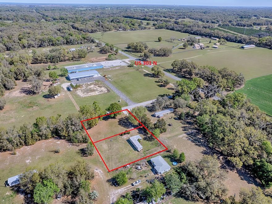 OWNER FINANCING AVAILABLE!! This 2-bedroom, 1-bathroom single wide mobile home on just under an acre in Bushnell, FL. The mobile home has already undergone some renovations, presenting a unique opportunity for you to step in and add finishing touches that truly make it your own. This is an ideal canvas for those who delight in personalizing their living spaces. Outside, the property features ample outdoor space, perfect for gardening, entertaining, or just enjoying Florida's beautiful weather. Whether you're hosting summer barbecues, starting a vegetable garden, or just lounging in the sunshine, this yard has the potential to become your private oasis. The property is currently separated into 2 parcels but don’t worry, the seller will combine to 1 at closing if the buyer would like or keep them separate and annex into the City of Bushnell. Don't miss your chance to own this property in Bushnell. Schedule your viewing today and start envisioning the possibilities!