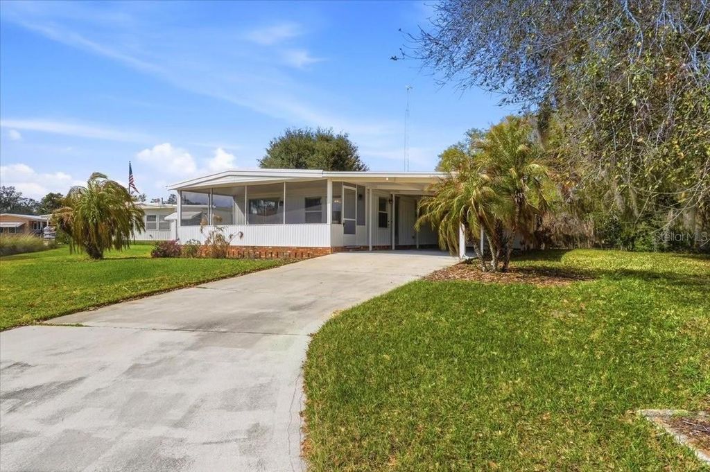 Photo of 41 Woodland Circle, Haines City, FL 33844 (MLS # P4938072)