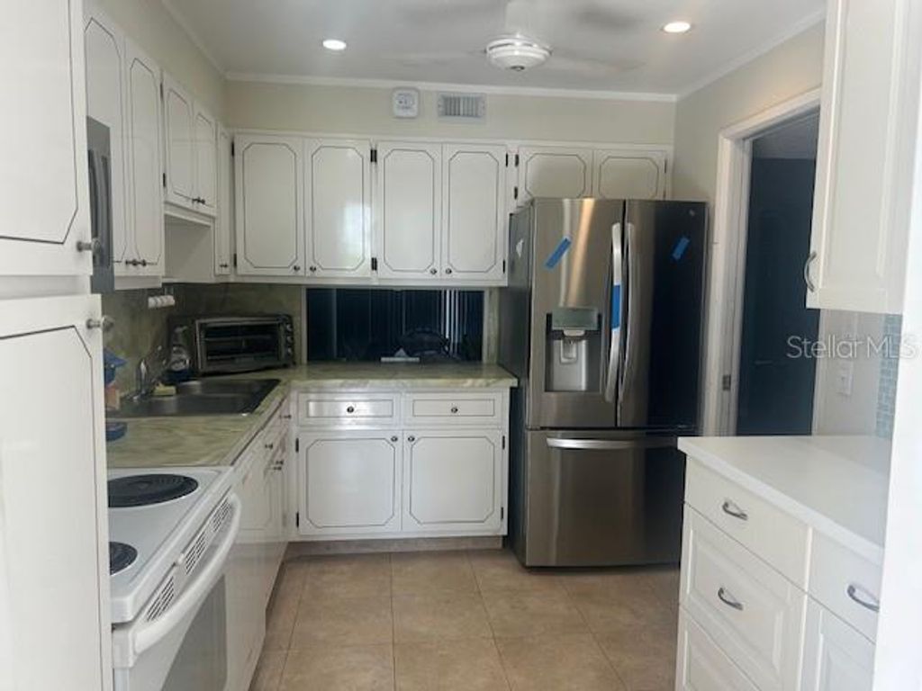 Photo of 7461 W Country Club Drive N #201, Sarasota, FL 34243 (MLS # A4674055)