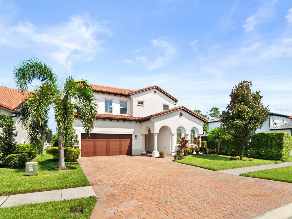 Photo of 10414 Royal Cypress Way, Orlando, FL 32836 (MLS # O6393856)