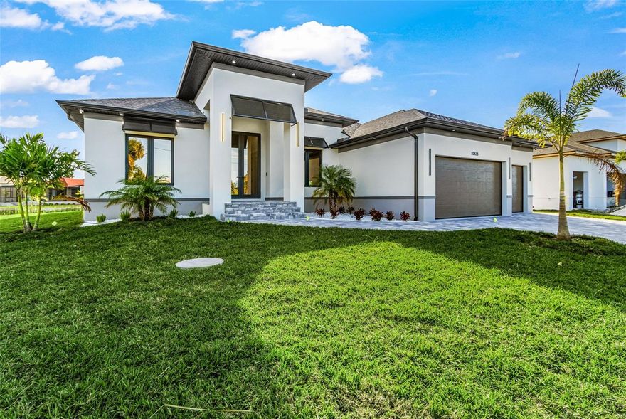 Completed Luxury and Modern Brand new house. The house has 14ft ceilings in the living room/kitchen/foyer. It is a 2250 sqft under A/C house with three full-size bedrooms and a large size office room(could be 4th separate bedroom)The entire house has a mat  porcelain floor which makes the house very bright. Each bedroom has its bathroom. Custom made closets at each bedroom and organized walking closet at master bedroom. The layout of the house is made with all important details and use of open spaces. The total house size is 3670 sqft with a three-car garage. All windows at bedrooms/office  are casements, which give the best unobstructed view and convenience of use. The custom kitchen is made from high quality plywood with slim shaker doors ,double height cabinets and quartz countertops with waterfall and quartz backsplash at entire kitchen.All kitchen appliances. wahser, dryer are LG. The house has 14ft ceilings in the living room/kitchen/foyer. The house has a full-size 3 bedrooms with 3 full bathrooms(each bedroom has its bath) + office room (possible to convert to 4th bdr) plus 1/2 bath + 3 car garage. The total house gross size is 3670 sqft. The living area is 2257 sqft. The house has a deep heated pool with a screened patio.The house has a 5ft deep heated pool with a Sun Deck and Waterfall. Hurricane proof  windows,and all sliding /entrance/garage doors. Tankless water heater.Electrical car charger. Pool water heater. The house is built on a steam wall with high elevation by all new city codes. Stainless steel THOR custom summer kitchen with grill, sink and fridge, outdoor shower at the  pool deck and RV/Boat outlet connections. Cameras monitoring system for perimeter of the house/ The house is for boat lovers and has direct ocean access with NO bridges. No height limit for a boat . A promising area that is developing very quickly, which contributes to rising real estate prices. Direct access to the canal provides excellent fishing or boating opportunities. Within a fifteen-minute drive of South Gulf Bay, you'll find six Gulf Coast beaches in Manasota Key and Boca Grande; five golf courses; as well as excellent shopping and dining options. Coral Creek Airport 7 min (3.6 miles) Charlotte Harbor Boat Storage 4 min (1.9 miles) Publix Super Market at Gulf Cove 10 min (6.3 miles) Vineland Elementary School 14 min (7.0 miles)L.A. Ainger Middle School 15 min (7.7 miles) Genesis Christian Academy 14 min (8.7 miles) Lemon Bay High School 22 min (11.6 miles) Sunseeker Resort Charlotte Harbor 35 min (21.3 miles)