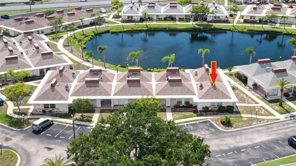 Photo of 4330 Tahitian Gardens Circle #E, Holiday, FL 34691 (MLS # TB8504374)