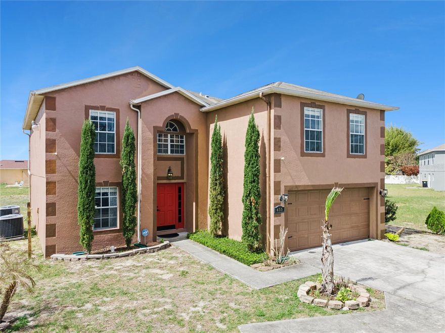 This masterfully crafted residence embodies the essence of Florida living at its finest. Nestled on a spacious ~1/3-acre lot, this home boasts an impressive array of feaures and upgrades, all completed just a year ago. These improvements include wood-inspired laminate flooring throughout, updated faucets and ceiling fans, custom framing and woodwork, and new ceramic tile and backsplashes in the bathrooms. Additionally, the home enjoyes a custom-built movie theater, along with a custom-built wine rack and smart, color-changing recessed lighting in the kitchen. The property boasts 4 bedrooms, 2.5 bathrooms, a versatile loft, a media room, and a 2-car garage. The moment you step through the front door of this 2,817 SF, exquisitely appointed home, you’re greeted by a soaring two-story foyer that sets the tone for an inviting and memorable experience. The expansive formal dining room decorated with beautiful custom made wine rack and chandelier is perfect for hosting gatherings. The kitchen is a chef’s delight, featuring crisp white wood cabinetry adorned with a subway-tile backsplash, expansive butcher-block countertop space and a freestanding island, plus stainless-steel appliances—including a refrigerator, range, dishwasher, and microwave—along with a freestanding hood, undermount sink, and oil-rubbed bronze faucet and fixtures. A cozy breakfast nook provides a spot for casual meals or lively family conversations. Beyond the kitchen is the family room, where you can relax with loved ones or step through the sliding glass doors into the sprawling backyard. The first floor is completed by a well-appointed laundry room with a front-loading touchscreen washer/dryer and a beautiful half bath. Ascending to the second floor, you’ll find a luxurious primary suite designed as a private retreat. The ensuite bathroom exudes spa-like luxury with a garden tub, separate shower stall, white penny-tile flooring and backsplash for a classic, elegant look, and walk-in closet for exceptional organization. Three additional bedrooms share a fully upgraded secondary bathroom, thoughtfully designed with double sinks, upgraded penny-tile flooring and backsplash and a stylish tub/shower combo. A spacious loft completes the second floor, offering endless possibilities such as a game room or flexible living area. Step outside to your huge backyard—perfect for outdoor entertaining, family gatherings, or soaking up the Florida sunshine. The seamless indoor-outdoor flow makes this home an entertainer’s dream. Located in the vibrant Poinciana community, the property offers easy access to major highways, hospitals, medical facilities, dining, and shopping options. This home isn’t just a residence—it’s a lifestyle. Experience the perfect blend of elegance and everyday comfort in this extraordinary home.