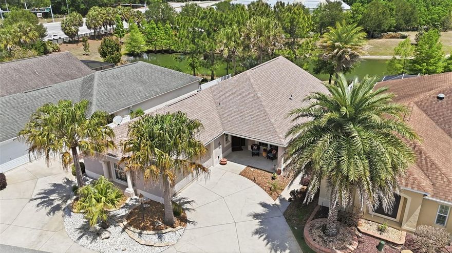 One or more photo(s) has been virtually staged. This is the one you've been WAITING to come on the market, here it is! WELCOME to the Reagan Villas of The Villages of Pine Ridge; this ONE-OWNER home HAS the best location with a WATER VIEW! Overlooking approximately a 2-acre pond, you will enjoy relaxing in your personal SWIM SPA made by Spa Manufacturers, Inc. while watching the WILDLIFE! Right on the other side of the water is an EAGLE PRESERVE, giving you front-row views of incredible wildlife! This courtyard villa boasts 3 bedrooms and 2 bathrooms with a PRIVATE en-suite that has a walk-in closet, dual sinks and private lavatory. Wake up to a lovely VIEW of the WATER from your bedroom window! LUXURY VINYL PLANK flooring throughout the home, NO carpet! Large kitchen with ample cupboard space and countertops; 2 islands--excellent for food prepping and a SOLAR TUBE for NATURAL DAYLIGHT! Breakfast bar with plenty of room for your bar stools, plus a SPACIOUS dining area for a 6-chair dining table. The refrigerator and dishwasher are NEWER and upgraded--dishwasher is a newer BOSCH, the industry's QUIETEST brand. The slider door leads to your PRIVATE courtyard patio, convenient for a BBQ grill and outdoor seating. From the living room, step thru another slider to the enclosed LANAI and out to your PRIVATE SWIM SPA that came with a 20 yr WARRANTY on the shell. Or, sit by the lovely cascading WATER FEATURE surrounded by soft sand for your toes. The backyard is WONDERFULLY PRIVATE and NO GRASS to mow anywhere! Enjoy your morning coffee on the COVERED FRONT PORCH and waive to the neighbors walking by. Enjoy 2 ADDITIONAL bedrooms perfect for your guests, an office, craft room or TV room! Included with the home is a Kenmore Elite water softener. A "Yesteryear" golf cart is being sold separately, ask for details. Ad Valorem tax is: $3.490. Non-Ad Valorem is: maintenance - $411.27, Fruitland Park fire district - $344.85, bond payment - $1,043.98. Bond balance: $12,485.97. Brownwood town square is about 15 minutes, Lake Sumter is about 20 minutes, Sawgrass about 25 minutes, Eastport about 35 minutes and Spanish Springs about 30 minutes, all by golf cart.