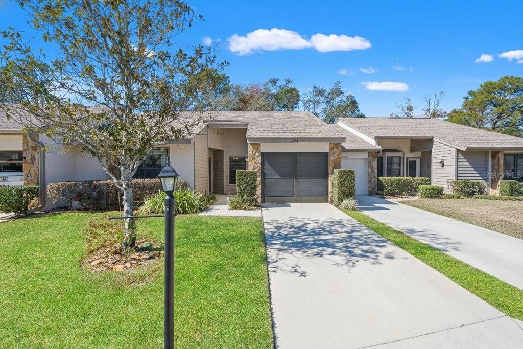 Photo of 2243 Wyndam Drive, Spring Hill, FL 34606 (MLS # W7882686)